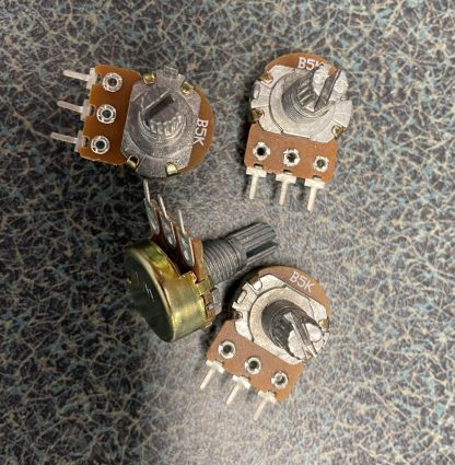 A photo of a group of classic WH148 potentiometers.